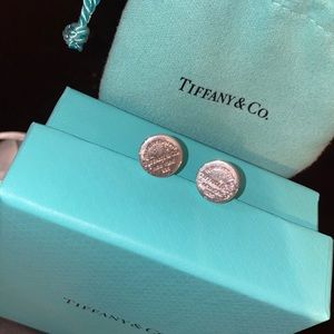 Tiffany & Co. circle stud earrings; with pouch, box & white ribbon